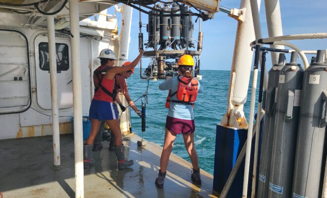 Measuring a 'dead zone': Scientists retrieve the CTD (conductivity, temperature, depth) package of ocean sensors after profiling dissolved oxygen at a station during the Shelfwide Hypoxia Cruise in the Gulf of America. (Image credit: Courtesy of Cassandra Glaspie/LSU)