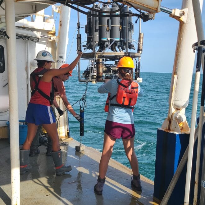 Measuring a 'dead zone': Scientists retrieve the CTD (conductivity, temperature, depth) package of ocean sensors after profiling dissolved oxygen at a station during the Shelfwide Hypoxia Cruise in the Gulf of America. (Image credit: Courtesy of Cassandra Glaspie/LSU)