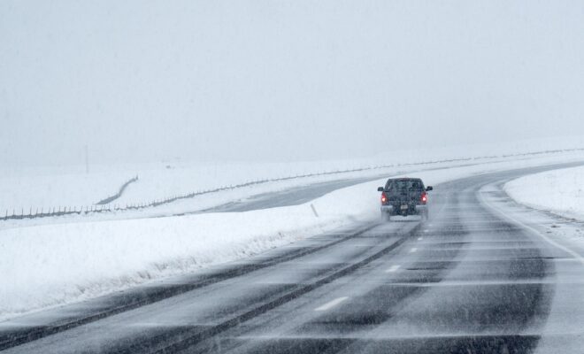 A car drives through a snowstorm in Broomfield, Colorado, in 2024. (Image credit: Bob Hyatt/NOAA)