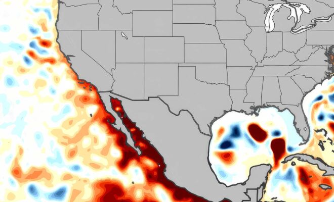 Map showing sea surface height anomalies using Darker reds to show sea levels higher than normal, while darker blues show heights below normal
